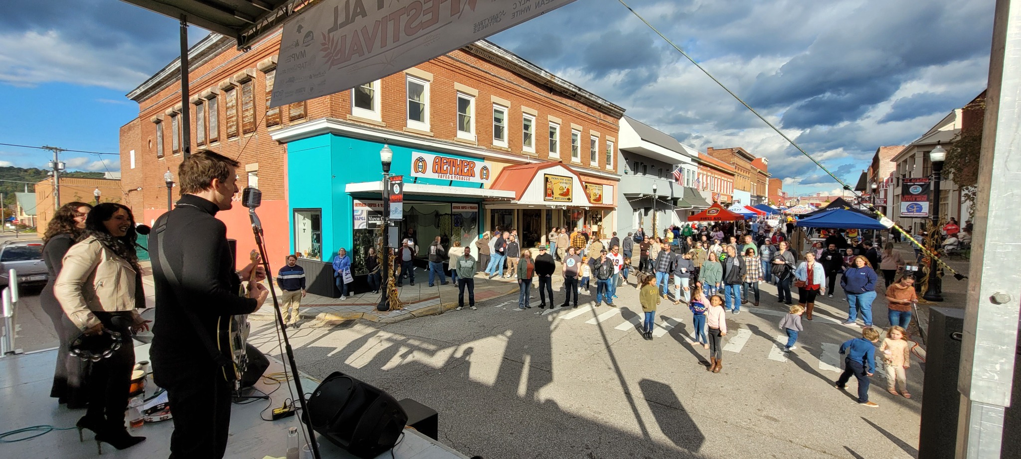 Live music and festival crowds on Main Street