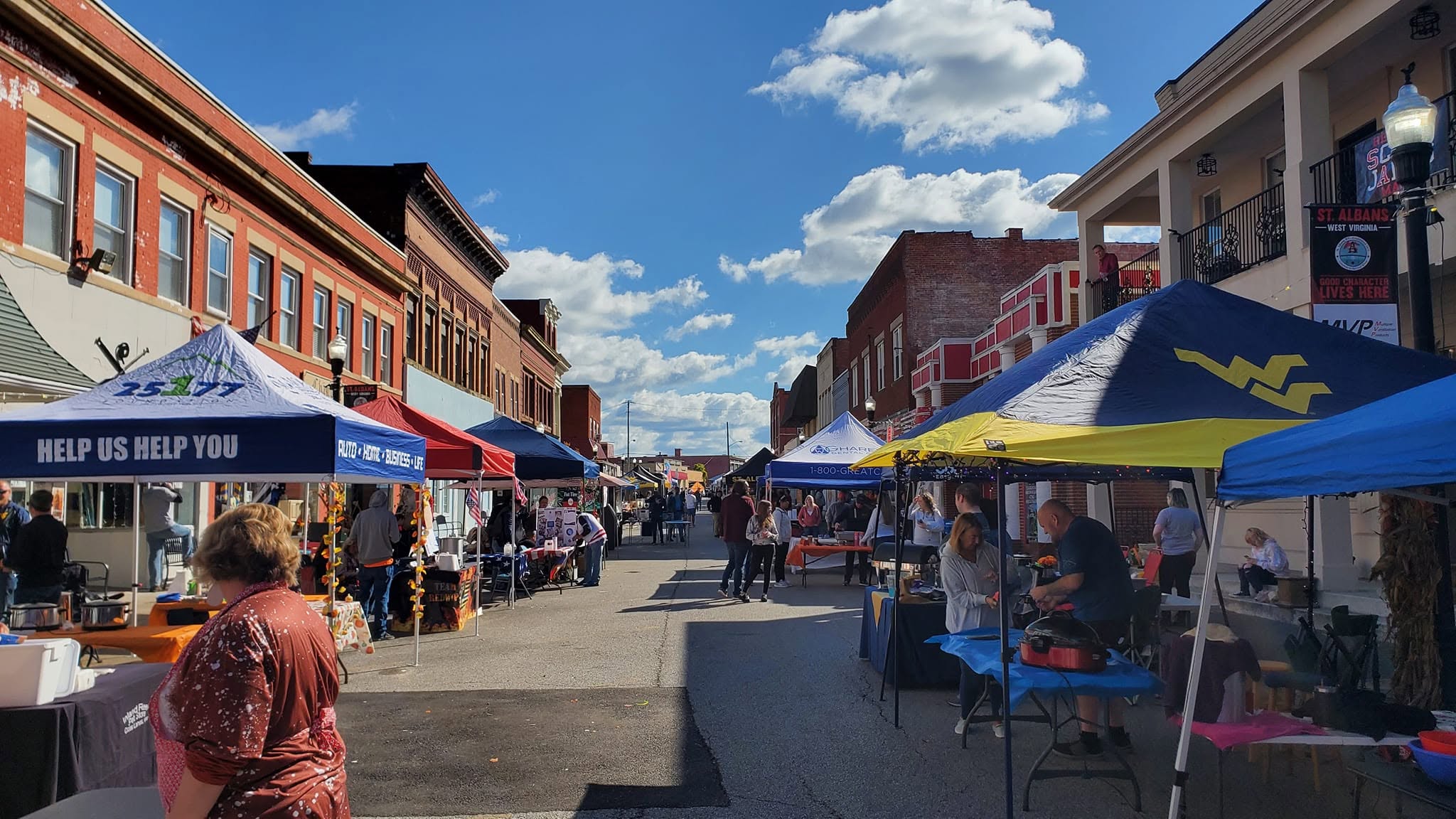Fall Y'all vendors and visitors on Main Street in St. Albans